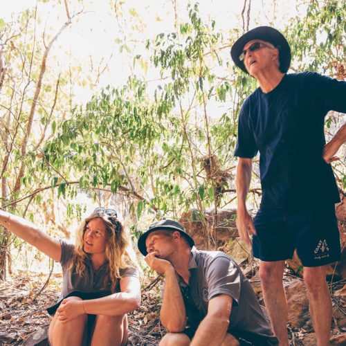 Four guests enjoying the view on a rocky hillside